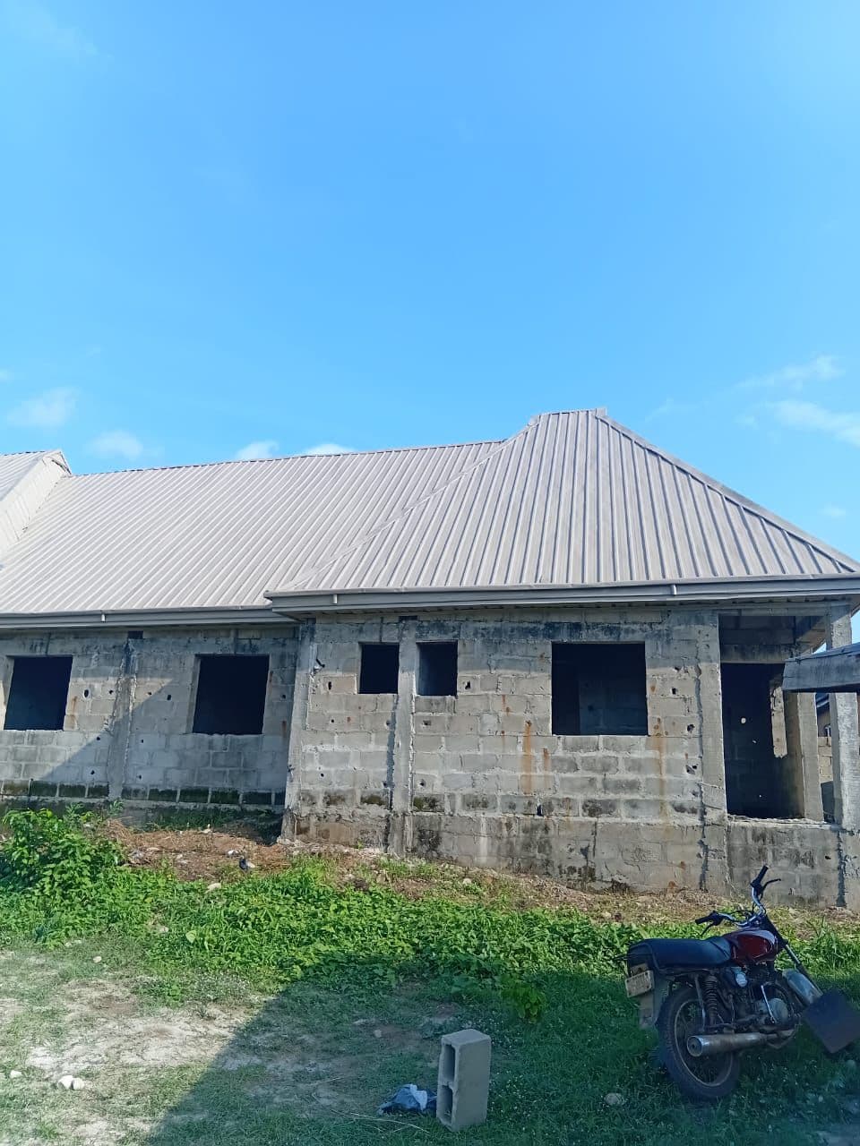 Finished roofing job supplied by Gods Promise Aluminium