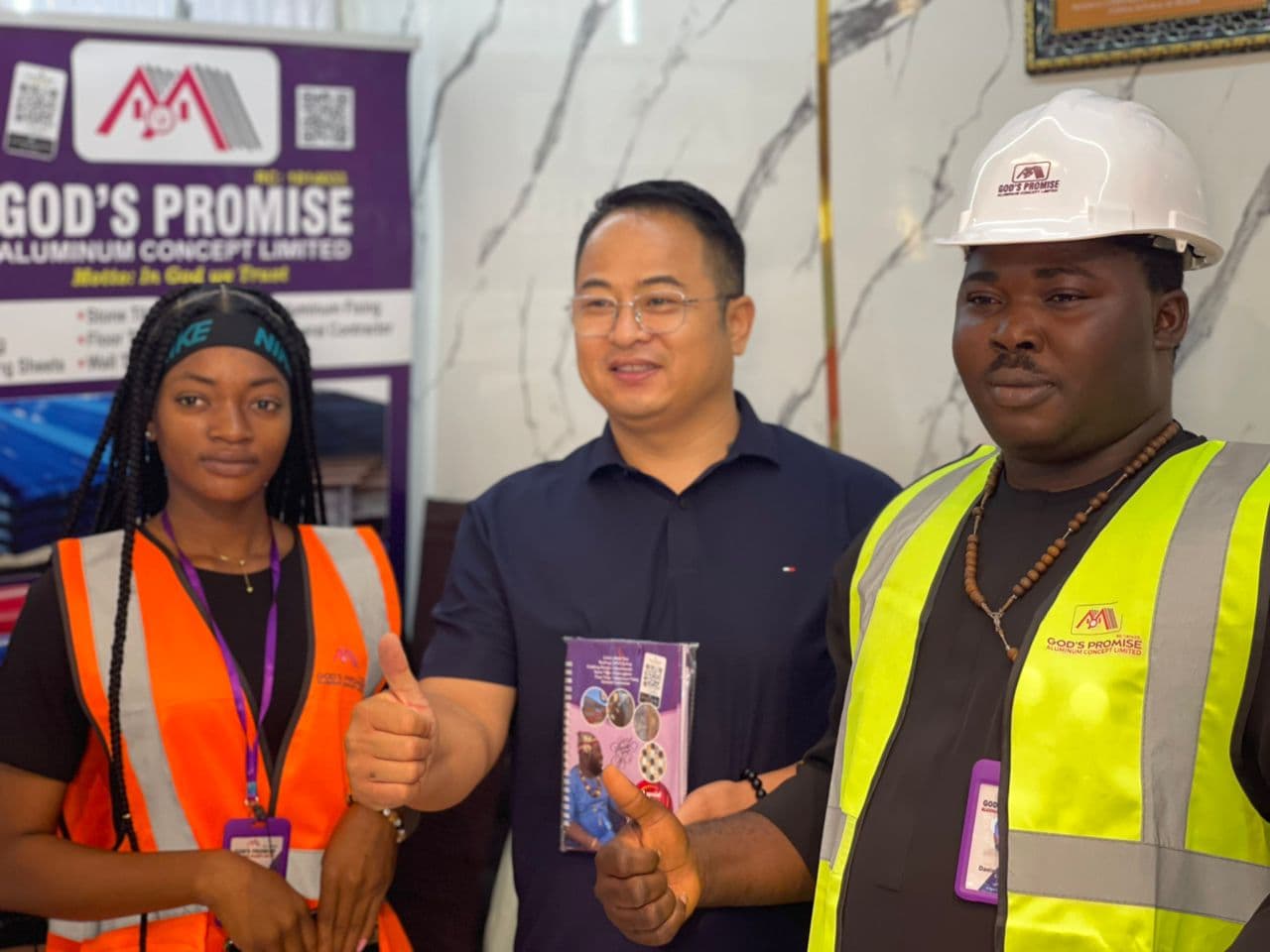 Gods Promise Aluminium CEO, client and staff at the factory