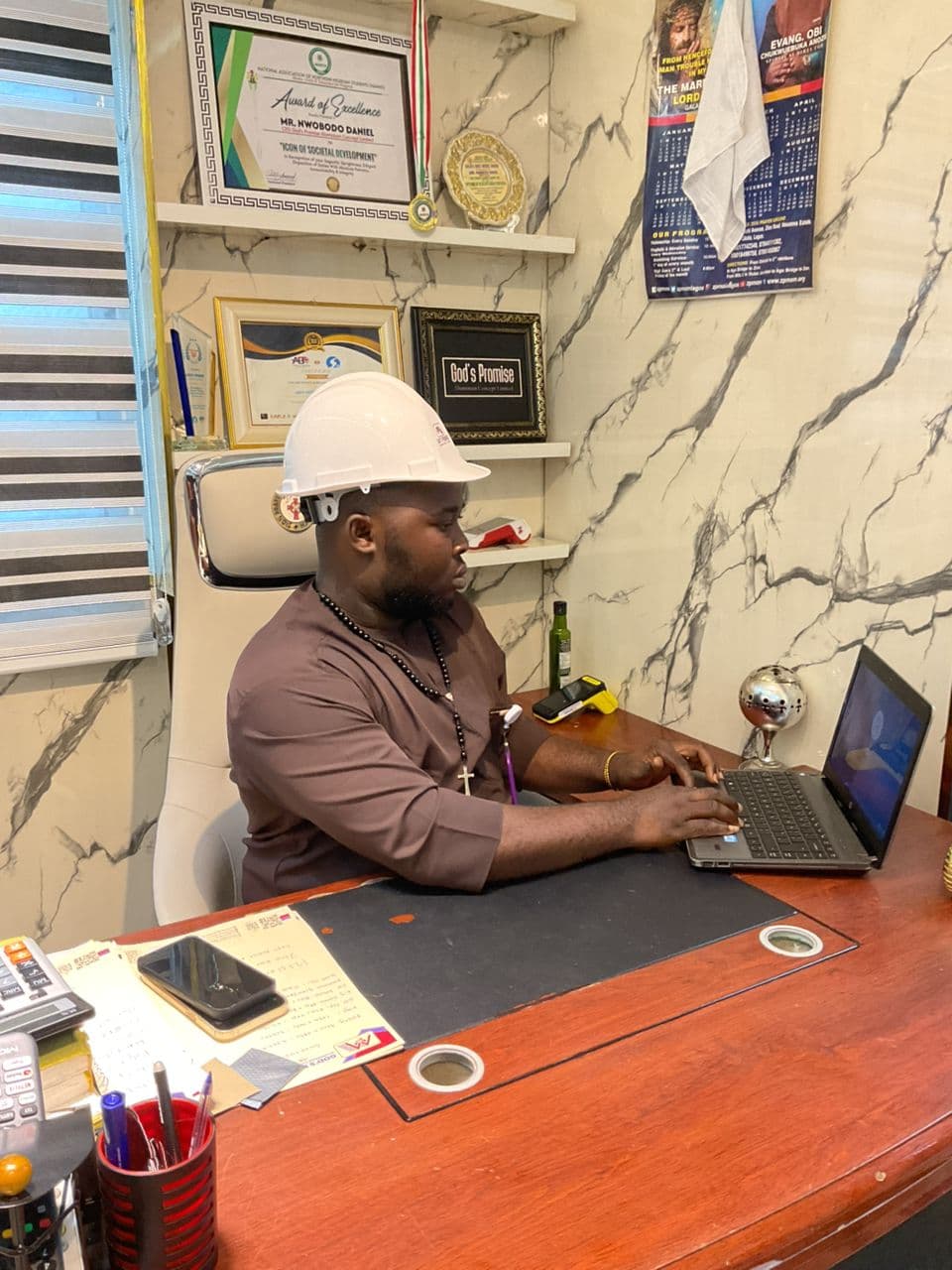 CEO at the Gods Promise Aluminium office
